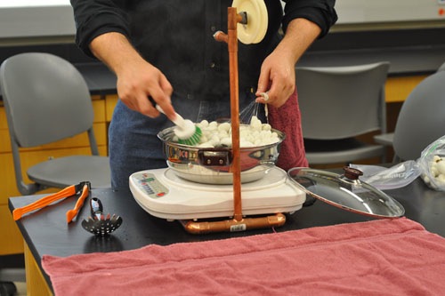 Using the brush to gather the ends of the silk